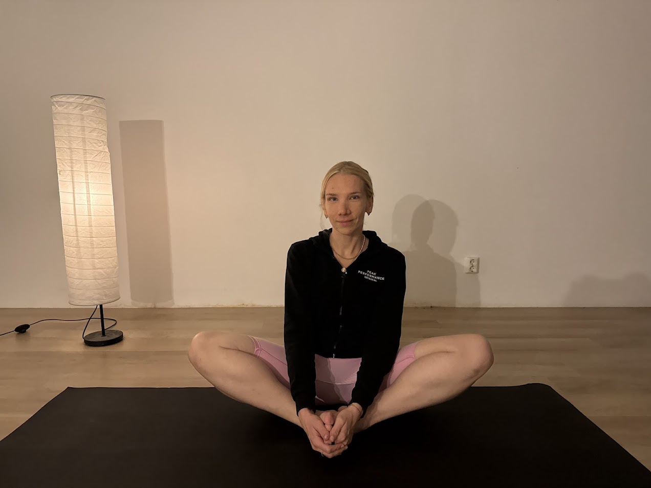 A welcoming image of a yoga instructor for the home page.